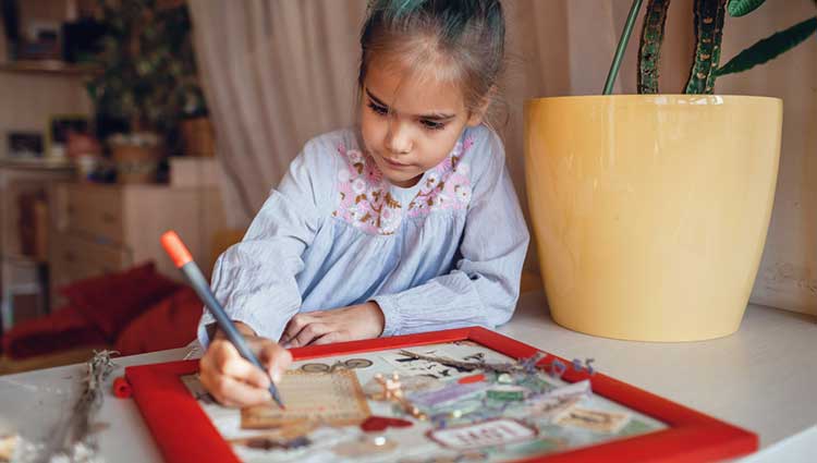 Child With Vision Board