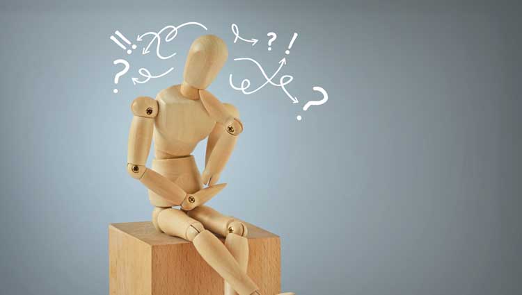 An image of a mannequin having trouble with indecision.