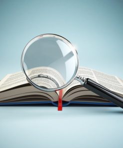 magnifying glass over open book depicting micro lessons