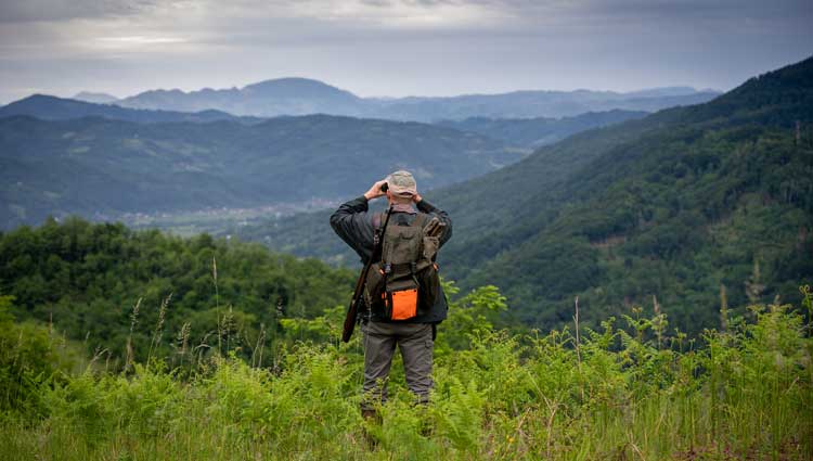 An image of a man in the wild showing a Job Search Takes Longer Than Expected.