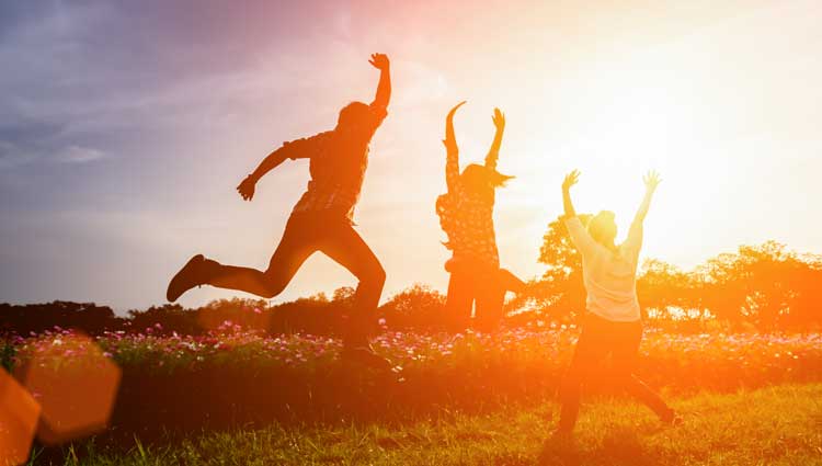 An image of people jumping for joy from their success.