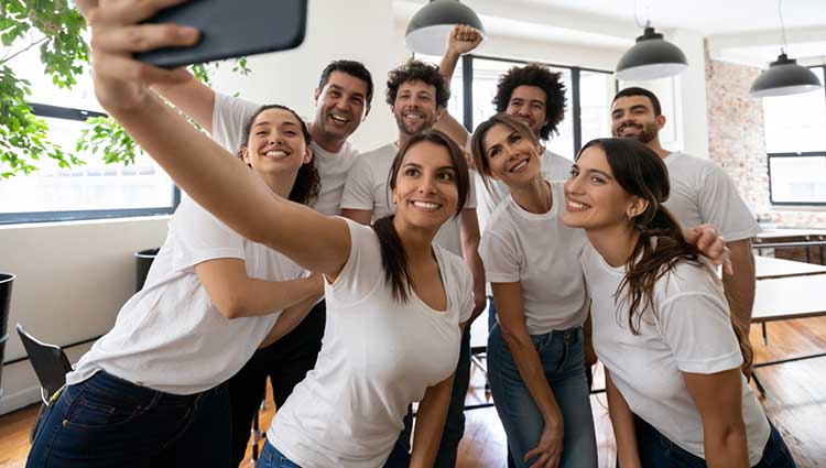 Selfie photograph of employees working at a nonprofit